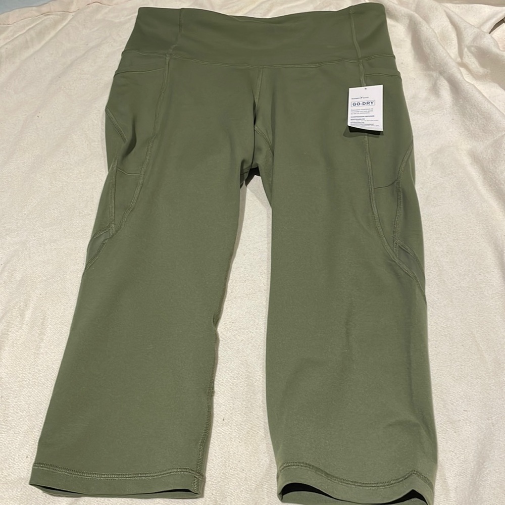 Olive coloured compression capris.